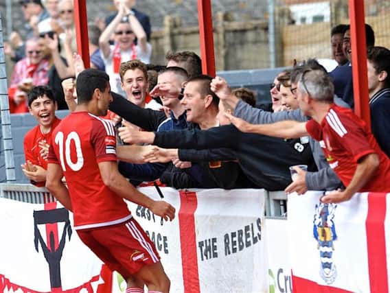Omar Bugiel celebrates a goal with the Worthing fans this season. Picture by Stephen Goodger