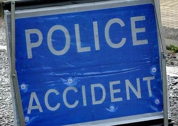 There is heavy congestion after a collision between two cars and a motorcycle