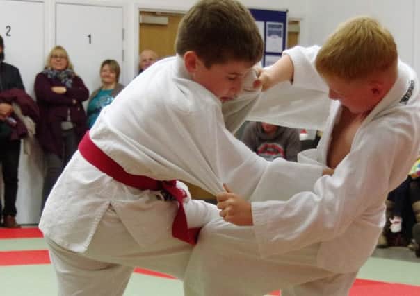 Ben Ellis and Nate Robinson at a Chichester Ronin Judo Club championship.