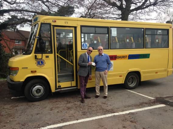 Midhurst's familiar yellow community bus