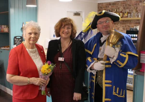 Guilda Care chief executive Suzanne Millard (middle) pictured with Jean Sams and Worthing town crier Bob Smytherman SUS-150324-082408001