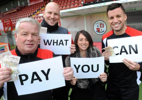 Crawley Town are holding a Pay What You Can day on Saturday v Hartlepool. Manager Dermot Drummy, Assistant Manager Matt Gray, Operations Directior Kelly Derham and Captain Jimmy Smith. Pic Steve Robards SR1700127 SUS-170901-154333001