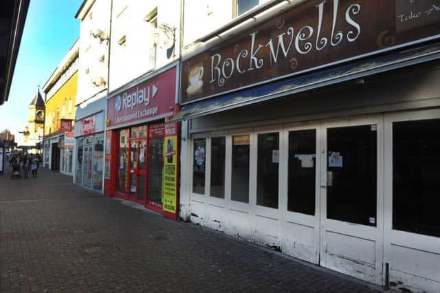 The row of empty shops will be demolished soon but in the meantime isn't so pleasing on the eye