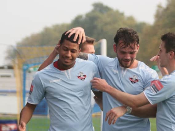 Jonte Smith celebrates a goal for Lewes. Picture by Angela Brinkhurst