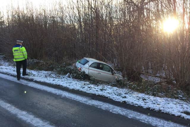A Fiat 500 ended up in a ditch off the A271 near Battle after crashing this morning (Friday, January 13). Photo courtesy of Battle Fire Station SUS-170113-110902001