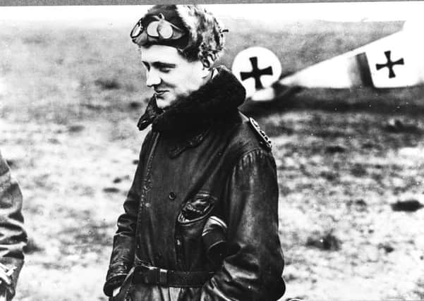 Manfred von Richthofen, wearing a leather coat, fur cap and goggles, photographed after landing from a combat flight. All pictures www.pplmedia.com