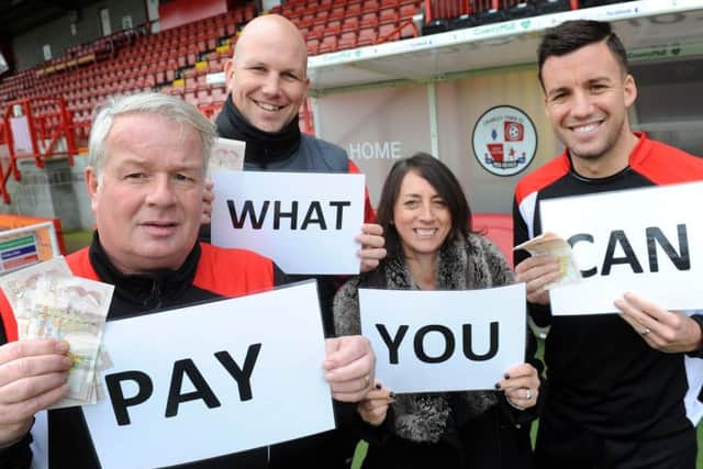 Crawley Town are holding a Pay What You Can day on Saturday v Hartlepool. Manager Dermot Drummy, Assistant Manager Matt Gray, Operations Directior Kelly Derham and Captain Jimmy Smith. Pic Steve Robards SR1700127 SUS-170901-154333001