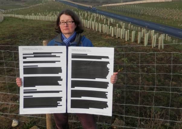 Andrea Needham by the Link Road with the previously redacted document