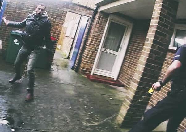 Sussex Police has released body worn video of a man attacking two officers with a hammer in Crawley last year. Picture: Sussex Police