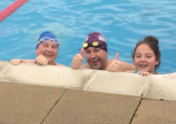 Louise Burgess, daughter Binnie and family friend James Sturdy at Arundel Lido on New YearÂ’s Day