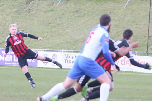 James Hammond opens the scoring for Lewes. Picture by Angela Brinkhurst