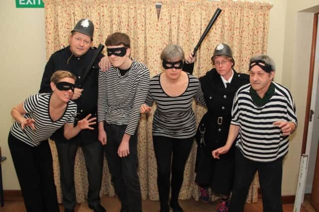 Cops and robbers from left: Leigh Trimmer, Michael Hammond, Oliver Hammond, Jenny Walker, Penny Maynard and Paul Milwright