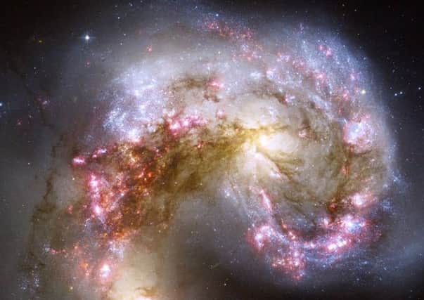 This is what a collision of galaxies looks like. (Photo: NASA)