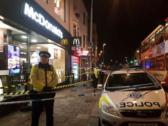 Police are at the scene of a stabbing at McDonald's in London Road