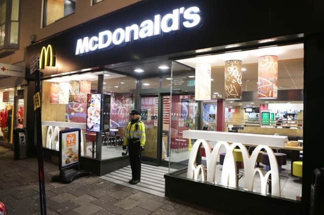 An 18-year-old was stabbed at McDonald's in London Road (Photograph: Eddie Mitchell) SUS-170118-095601001