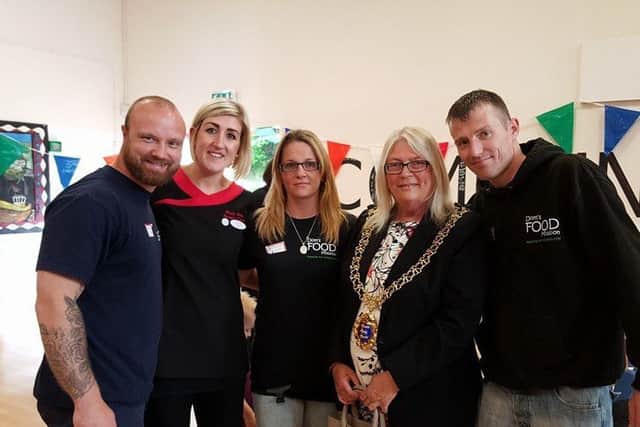 The Dom's FOOD Mission team with Hastings mayor Judy Rogers. Photo courtesy of Dom's FOOD Mission SUS-170118-162525001