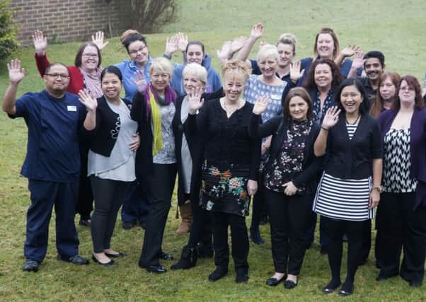 Staff from the care home met for a photograph to celebrate the good news