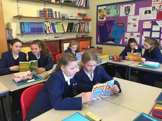 Farlington School pupils enjoy reading in their Geography lesson