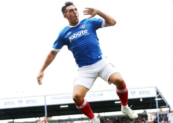Gary Roberts celebrates his goal in Pompey's 3-0 win over Crawley earlier in the season Picture: Joe Pepler