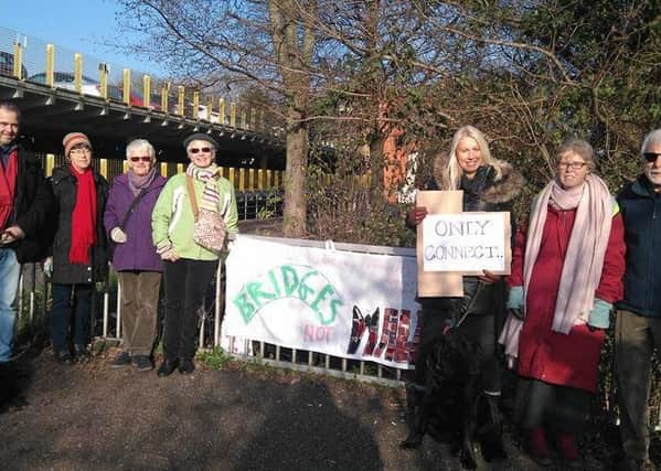The Bridges not Walls banner drop in Chichester on Friday