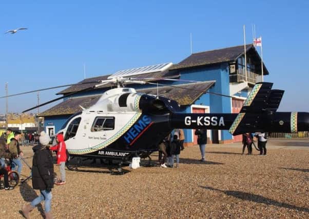 The air ambulance landed on Hastngs Beach. Picture Kevin Boorman