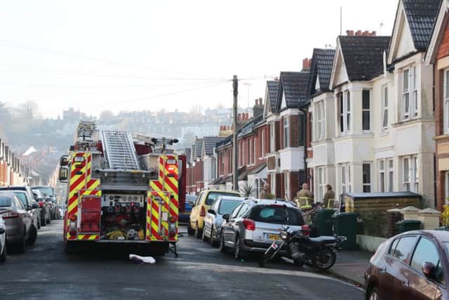 Firefighters at the scene of a fire in Loder Road (Photograph: Eddie Mitchell) SUS-170123-104648001
