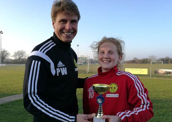 Crawley Wasps' Jade Elphick receives her player of the match award from manager Paul Walker following a great display against Chichester City Development SUS-170123-135729002