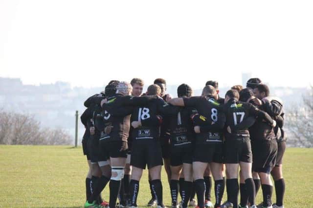 All Blacks in a huddle. Picture by Russell Chatfield
