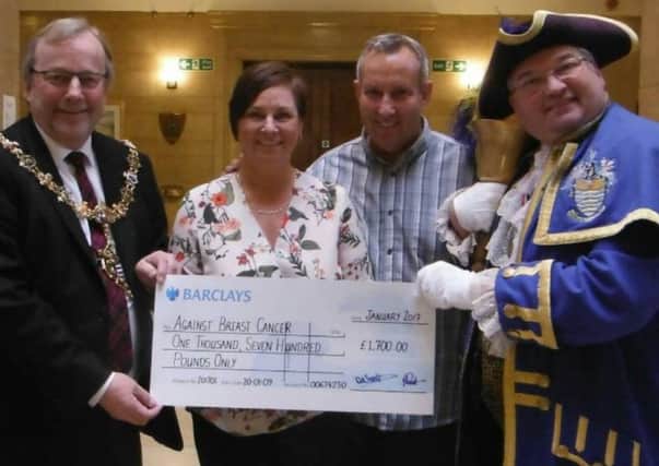 Mark and Debbie Scott with mayor of Worthing Sean McDonald and town crier Bob Smytherman