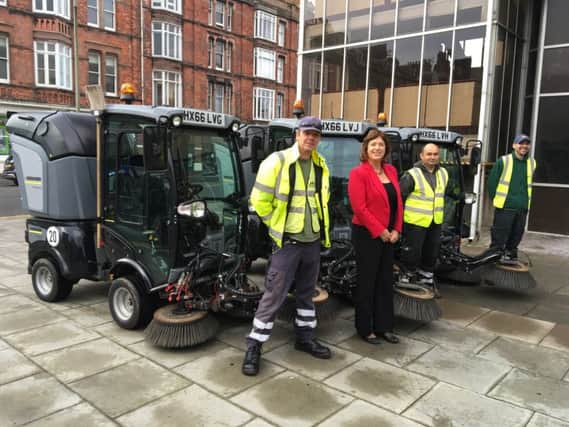 Cllr Gill Mitchell and council staff with the new sweeper machines SUS-170124-103102001