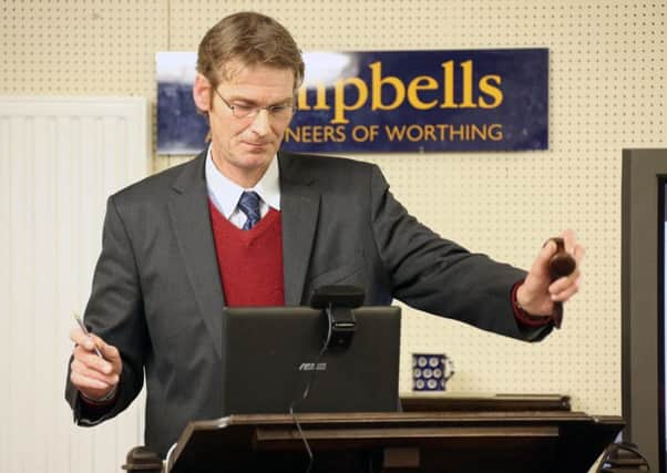 The auction at Campbells in Worthing. Pictured is auctioneer Paul Campbell. Picture: Eddie Mitchell