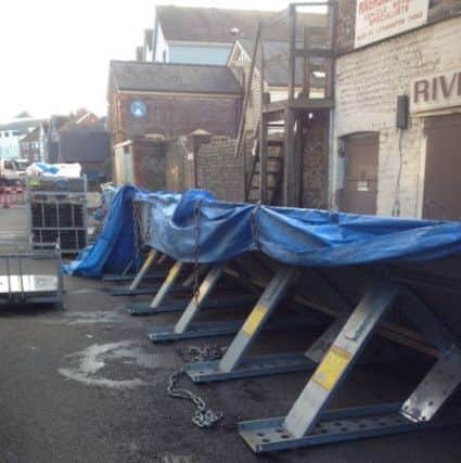 The temporary flood defences deployed in River Road. Picture: Terry Ellis