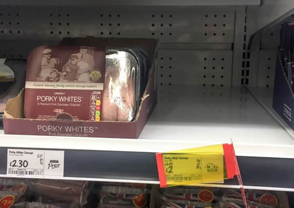 A empty shelf of sold out Porkt Lights sausages