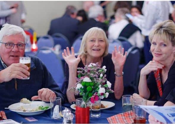 More than 100 revellers enjoyed live music and a Scottish feast