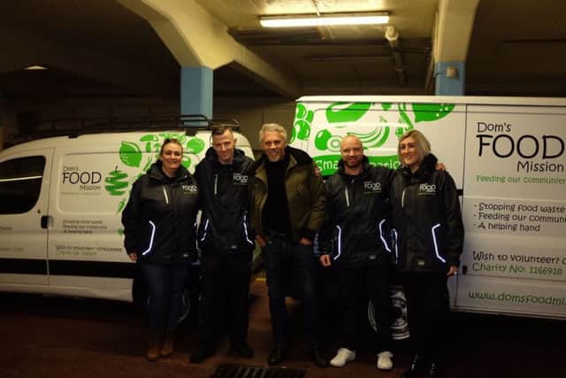 The team at Dom's FOOD Mission with Wayne Lineker. Photo courtesy of Dom Warren SUS-170125-095146001
