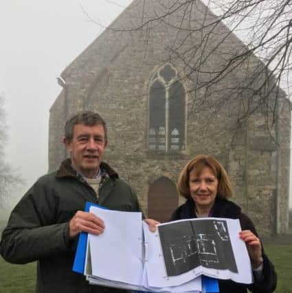 Chichester District Council archaeologist James Kenny and cabinet member Susan Taylor showing off the scan of the three Roman structures