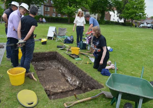 Local archaeologists carrying out the trial excavation last summer which confirmed the Roman find
