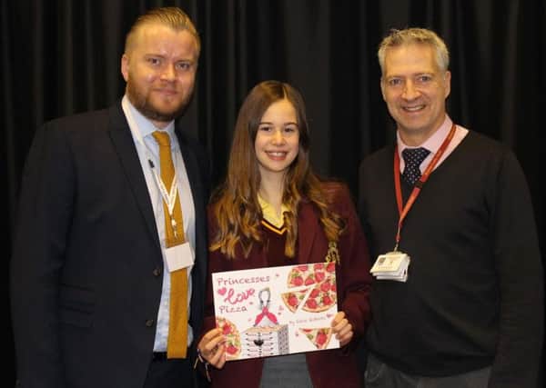 Adam Rowland from Evonprint, Ellie Roberts and Rob Goldsmith, Head of House at Bishop Luffa School.