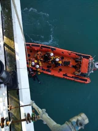 Brighton's lifeboat crew rescued a man from underneath the Palace Pier