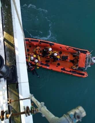 Brighton's lifeboat crew rescued a man from underneath the Palace Pier