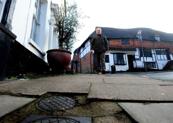 Graham Pooley on the pavement which claimed two victims
