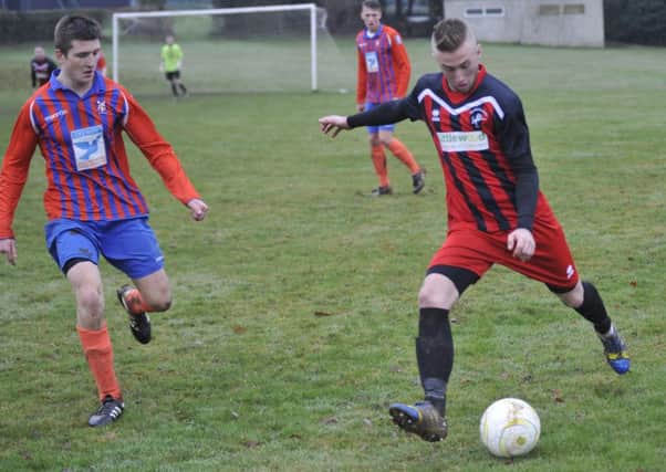 Action from Battle Baptists' last outing, at home to Hollington United, on Saturday January 7.