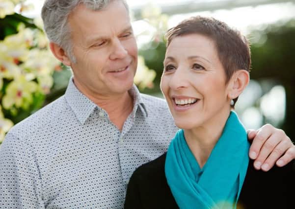 Angela Walker and her husband Hugh pose for the photographer for Ovarian Cancer Action