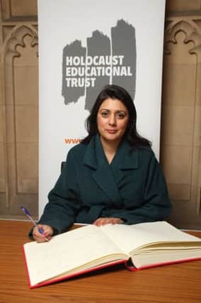 Nusrat Ghani MP signs the Holocaust Educational Trust Book of Commitment SUS-170127-134038001