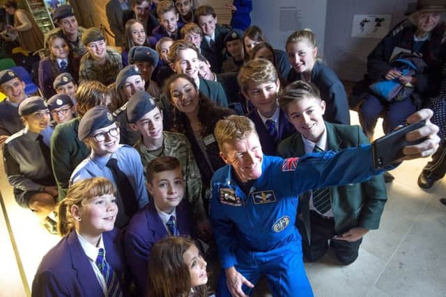 Major Tim posing with students on his visit to the Novium Museum