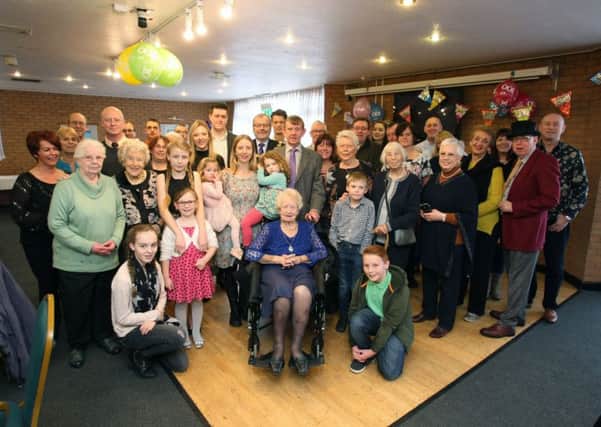 Worthing mayor Sean McDonald, centre, joins family and friends for Joy Trusslers 100th birthday celebration. Picture: Derek Martin DM1713284a