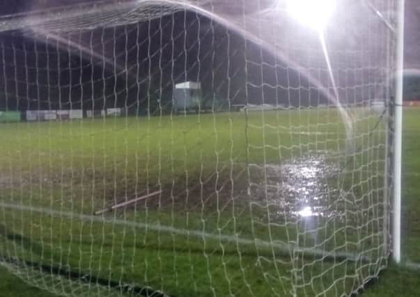 A wet goalmouth at Burgess Hill Town's Green Elephants Stadium following the postponement of their match against Bognor Regis Town. Picture by Graham Carter SUS-170131-221833002