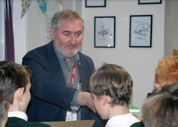 Children's laureate Chris Riddell, a prolific writer and illustrator, talks to pupils at Downsbrook Primary School in Worthing