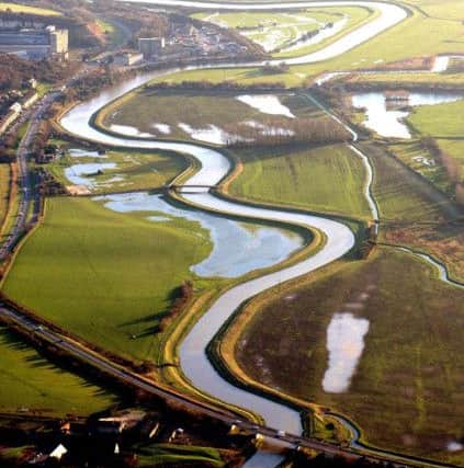 An aerial view of River Adur at Shoreham and Upper Beeding, showing the flooded flood-plain near the cement works