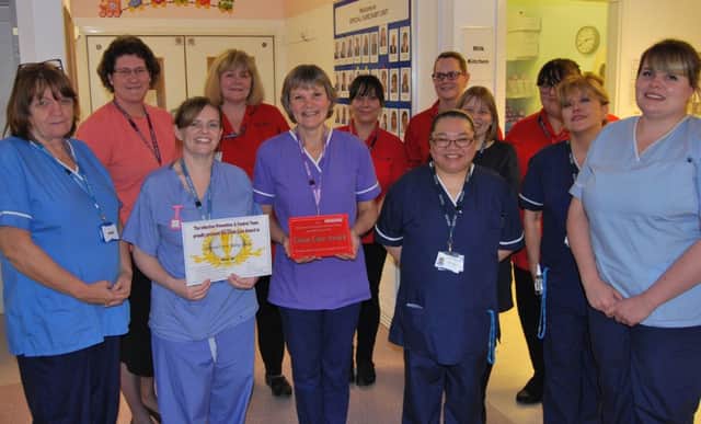 The staff at the Conquest Hospital Special Care Baby Unit being presented with a Clean Care Award. SUS-170102-155510001